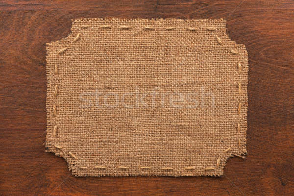 Frame of burlap, lies on a background of wood Stock photo © alekleks