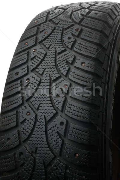 Old winter studded tire Stock photo © alekleks