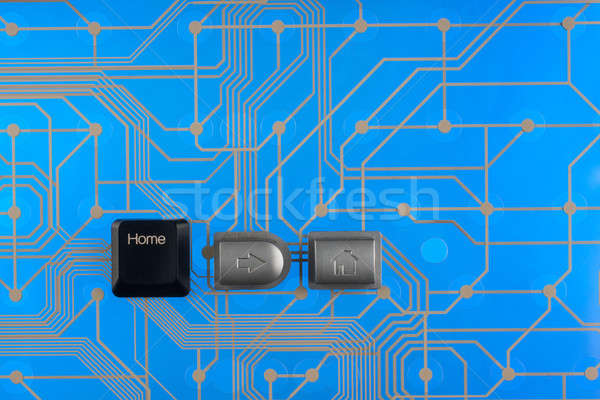 Keypad home on blue background  Stock photo © alekleks