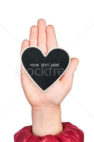 Heart in a child's hand with space for your text Stock photo © alekleks