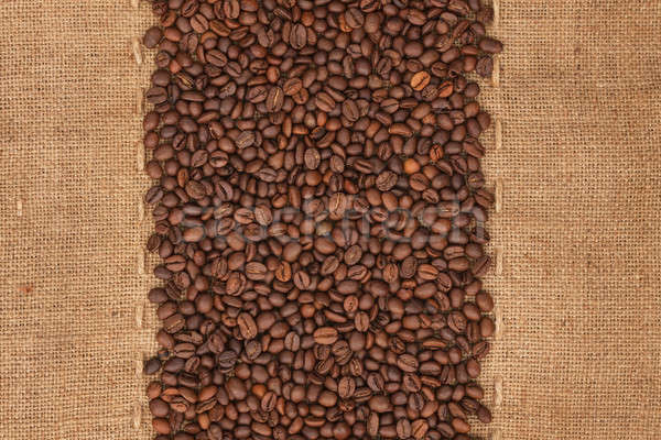 Coffee beans lying on sackcloth Stock photo © alekleks