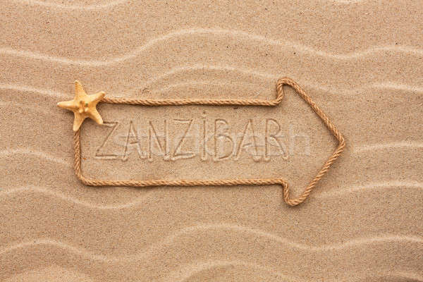 Stock photo: Arrow made of rope and sea shells with the word Zanzibar on the 