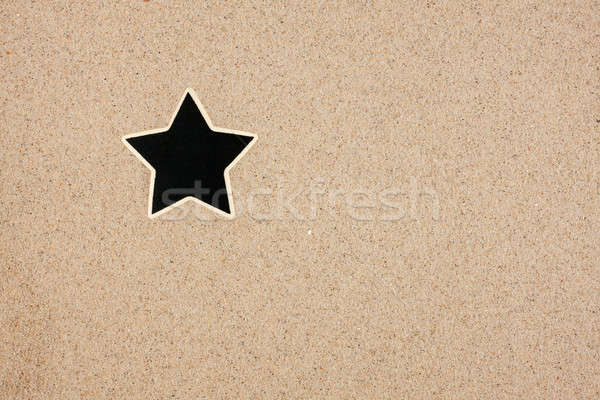 Pointer, ads board in the form star in the sand Stock photo © alekleks