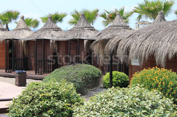 Stock photo: Bathing boxes in a tropical beach