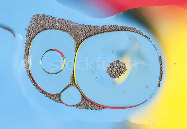 Öl Tropfen Wasseroberfläche abstrakten Licht Hintergrund Stock foto © AlessandroZocc