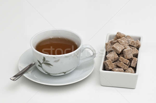 Taza de té azúcar moreno relajarse tiempo ventana taza Foto stock © AlessandroZocc
