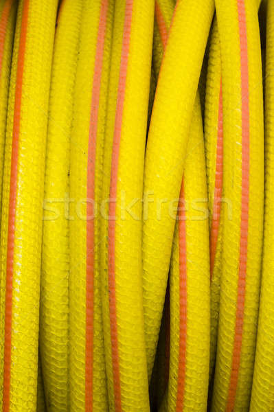 Yellow and orange water hose Stock photo © AlessandroZocc