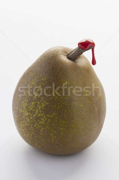 Green pear with red sealing wax Stock photo © AlessandroZocc