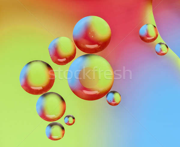Petróleo gotas superficie del agua resumen luz fondo Foto stock © AlessandroZocc