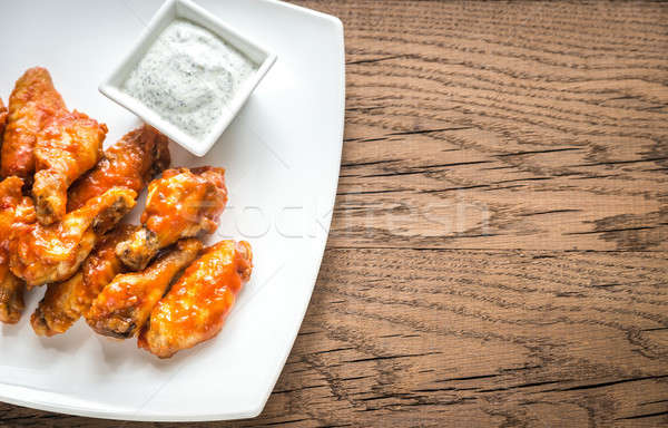 Portion of buffalo chicken wings Stock photo © Alex9500