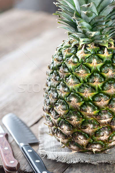 Pineapple on the wooden background Stock photo © Alex9500