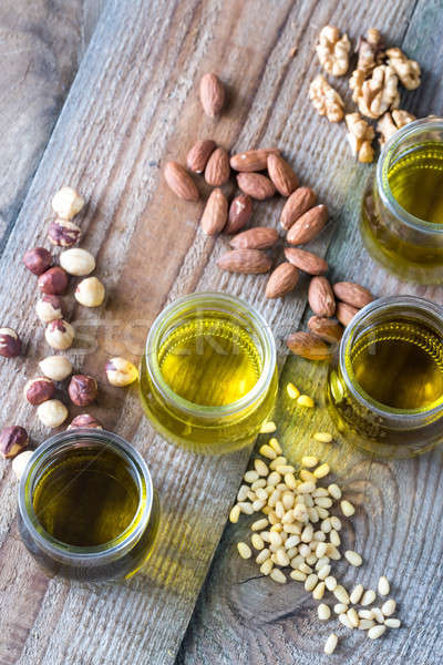 Glass jars with different kinds of nut oil Stock photo © Alex9500