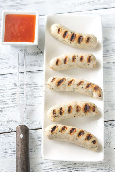 Grilled sausages with sweet chili sauce Stock photo © Alex9500