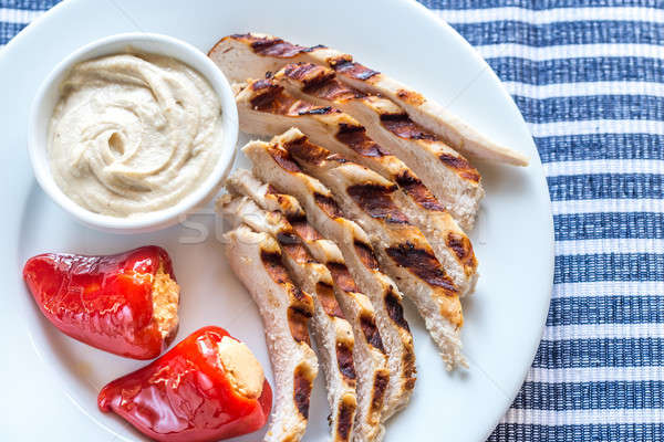 Grilled chicken with stuffed peppers and tahini sauce Stock photo © Alex9500