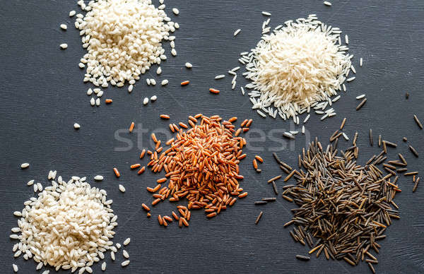 Different kinds of rice on the dark background Stock photo © Alex9500