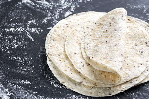 Stack of tortillas on a black surface Stock photo © Alex9500