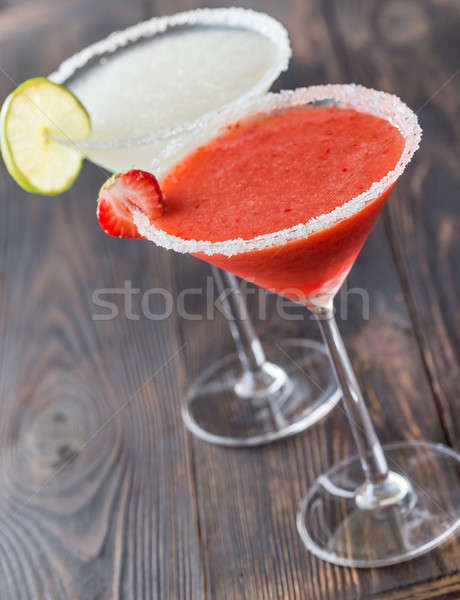 Glasses of lime and strawberry margarita cocktail Stock photo © Alex9500