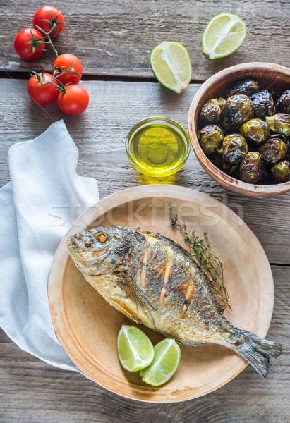 Grilled Dorade Royale Fish with fresh and baked vegetables Stock photo © Alex9500