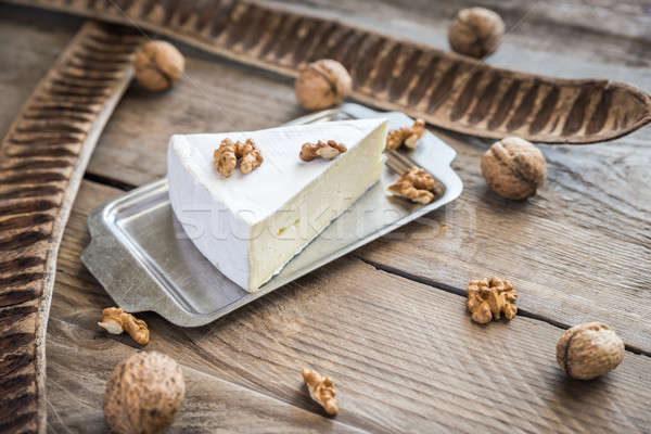 Stock photo: Brie cheese with nuts