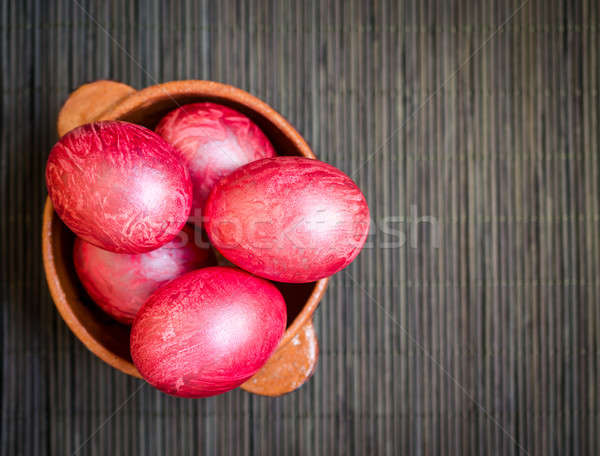 Colorful eggs in clay bowl Stock photo © Alex9500