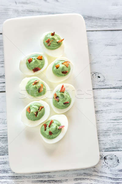 Spinach and bacon deviled eggs Stock photo © Alex9500