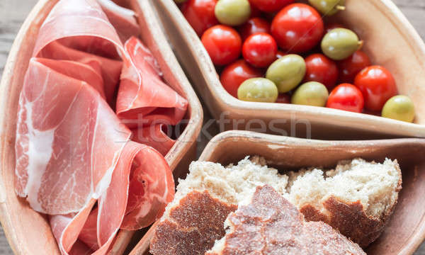 Jamon with bread and cherry tomatoes Stock photo © Alex9500