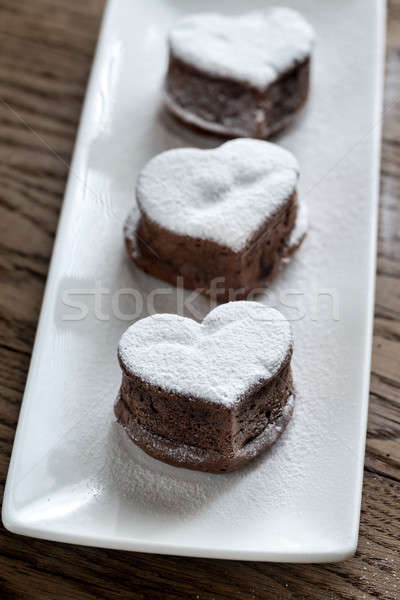 Chocolate lava cakes in the shape of heart Stock photo © Alex9500
