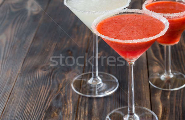Glasses of lime and strawberry margarita cocktail Stock photo © Alex9500