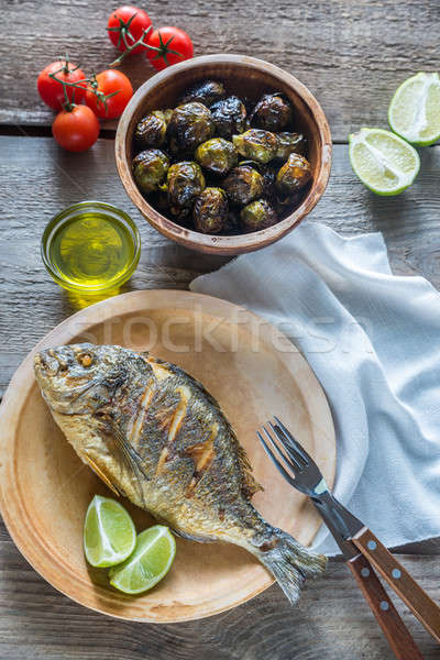 Grilled Dorade Royale Fish with fresh and baked vegetables Stock photo © Alex9500