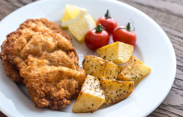 Portion of schnitzel with garnish Stock photo © Alex9500