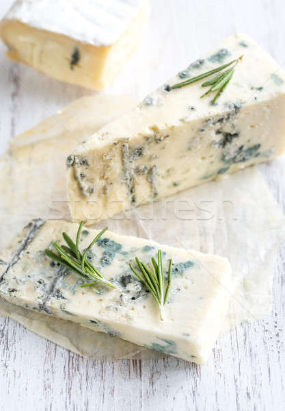 Various types of cheese on the wooden board Stock photo © Alex9500