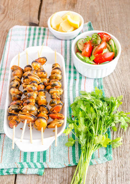 Mussel skewers with fresh salad Stock photo © Alex9500