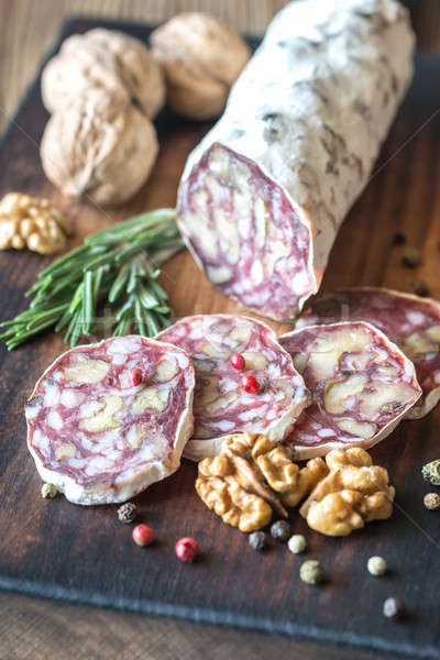 Stock photo: Walnut salami on the wooden board