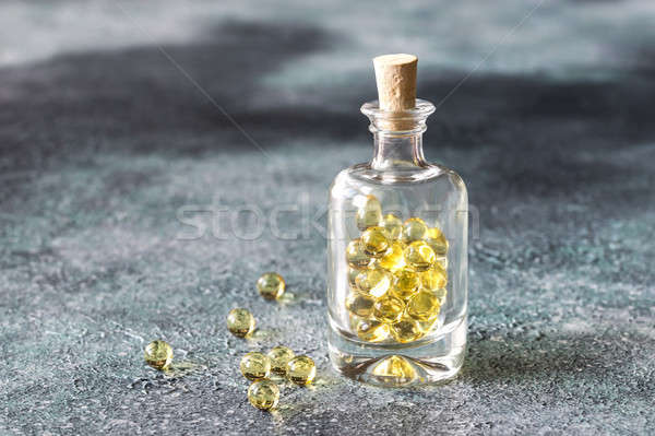 Omega-3 fish oil capsules in the glass bottle Stock photo © Alex9500
