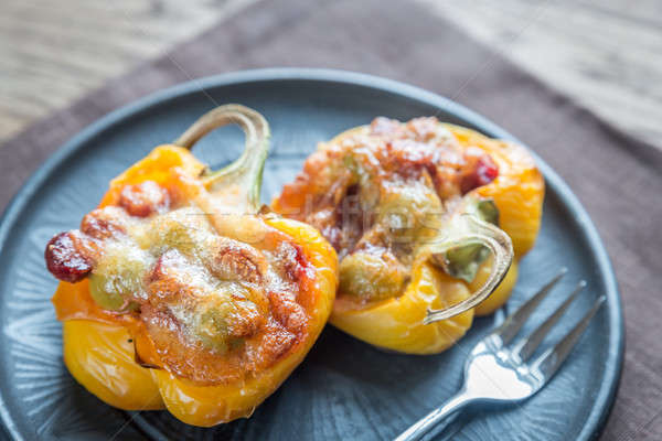 Stuffed peppers with sausages and mozzarella topping Stock photo © Alex9500