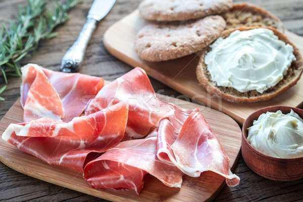 Slices of jamon and sandwich with cream cheese Stock photo © Alex9500