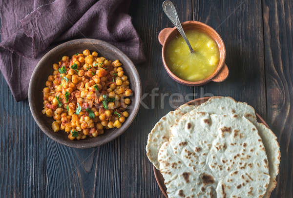 Bowl of chana masala with flatbread Stock photo © Alex9500