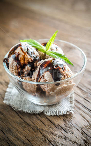 Chocolate ice cream with dessert topping Stock photo © Alex9500