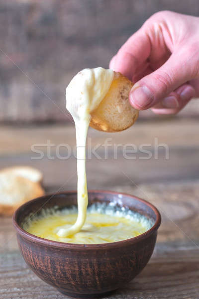 Bowl of cheese dip with toasts Stock photo © Alex9500