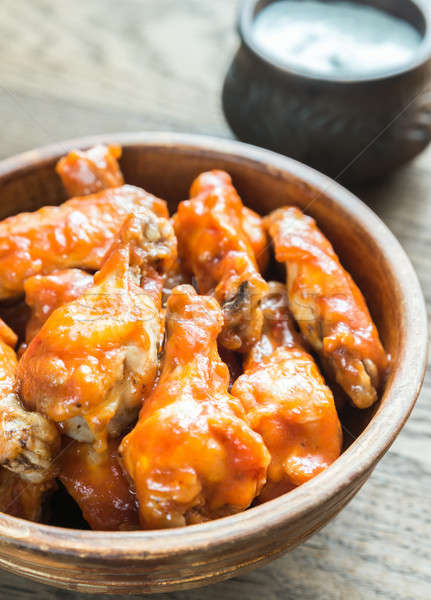 Bowl of buffalo chicken wings Stock photo © Alex9500