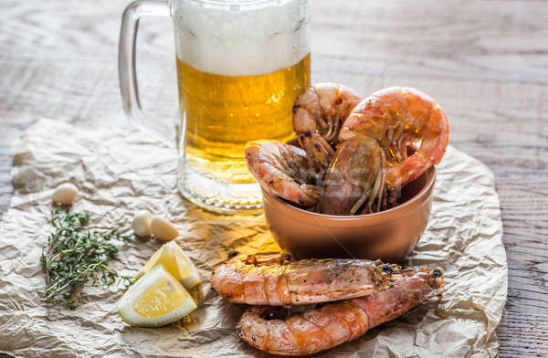 Fried shrimps with glass of beer Stock photo © Alex9500