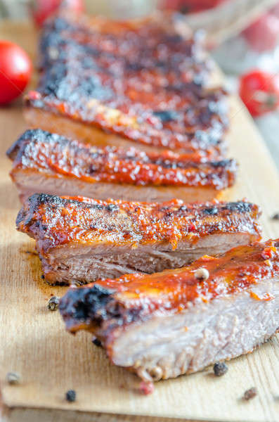 Stock photo: Grilled pork ribs in barbecue sauce