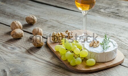 Two martini glasses with olives on martini picks Stock photo © Alex9500