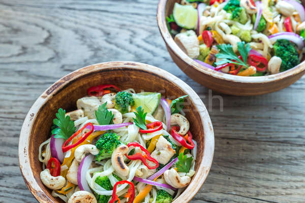 Two bowls of chicken noodle stir-fry Stock photo © Alex9500