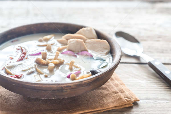 Bowl of thai tom kha kai soup Stock photo © Alex9500