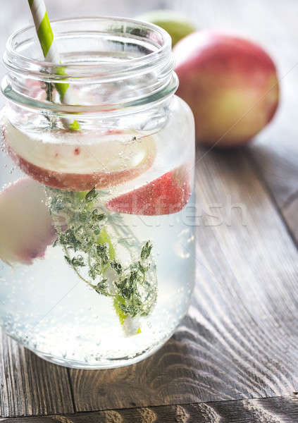 Glass jar of lime water with slices of peach Stock photo © Alex9500
