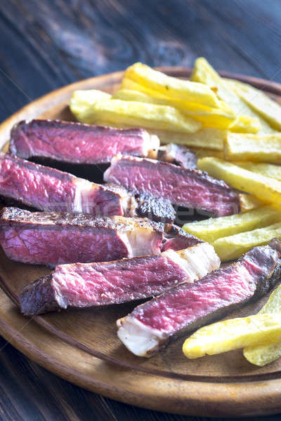 Beef steak with fried potatoes Stock photo © Alex9500