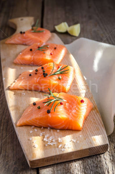 Raw salmon steaks on the wooden board Stock photo © Alex9500