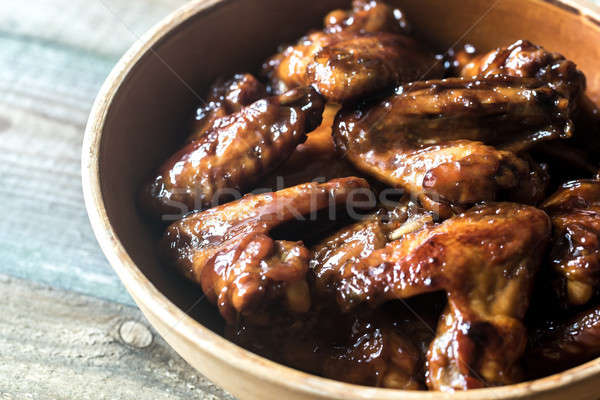 Bowl of teriyaki chicken wings Stock photo © Alex9500