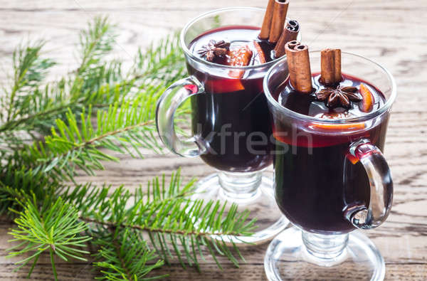 Two glasses of mulled wine with fir branch Stock photo © Alex9500
